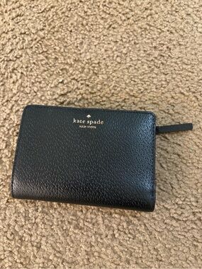 kate spade black pebbled leather zip-around card wallet with gold logo